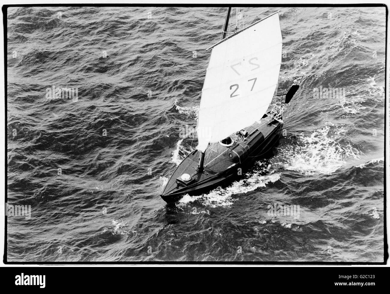 AJAX NEWS PHOTOS. 1980. PLYMOUTH,ENGLAND. - OSTAR START - MIKE RITCHIE SAILING JESTER, ONE OF THE SMALLEST YACHTS IN THE RACE TO NEWPORT R.I.  PHOTO:JONATHAN EASTLAND/AJAX REF:HDD/80/OSTAR/JESTER Stock Photo