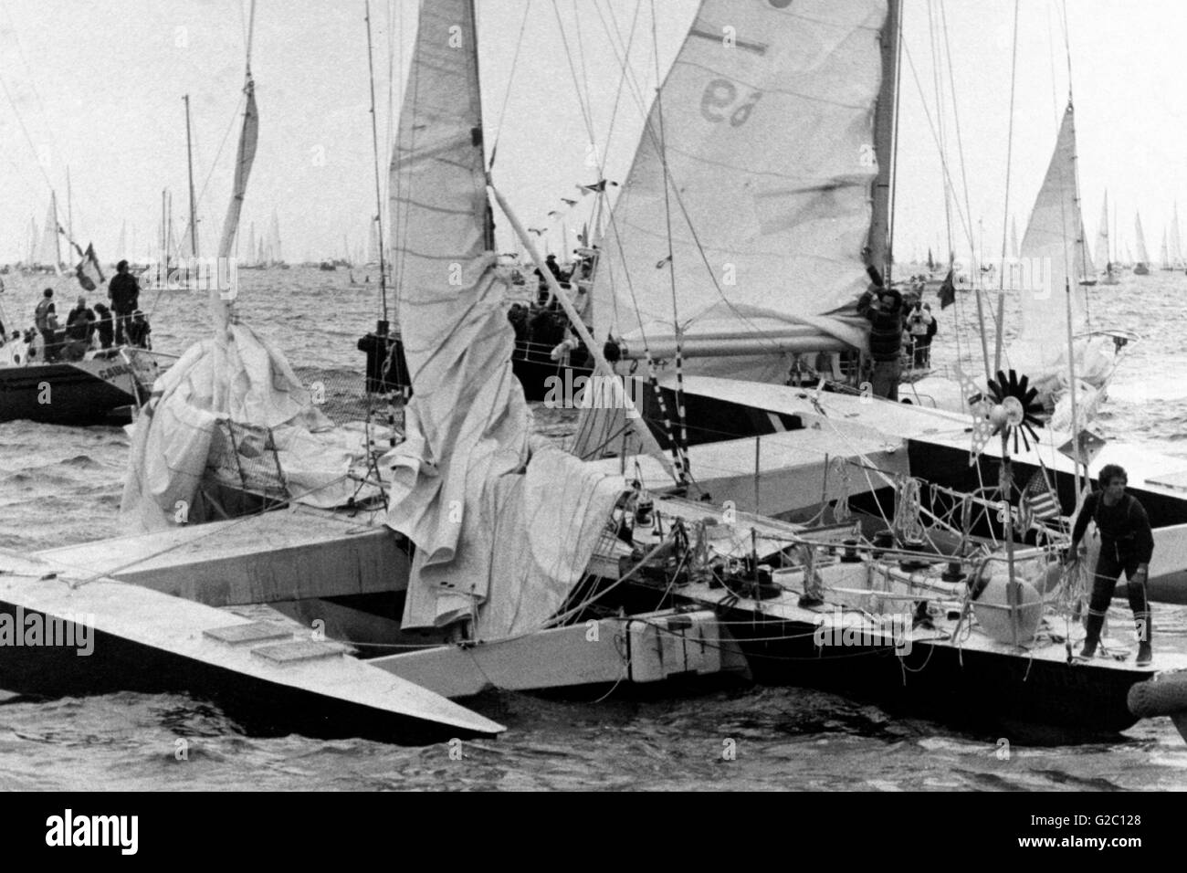 AJAXNETPHOTO. 7TH JUNE, 1980. PLYMOUTH, ENGLAND. - OSTAR 1980 - KRITER VII SKIPPERED BY TOM GROSSMAN (USA) IN COLLISION WITH GARUDA, SKIPPERED BY VICTOR SAGI (ESP)  JUST BEFORE THE START. PHOTO:TONY CARNEY/AJAX  REF:KRITER VII 1980 02 Stock Photo