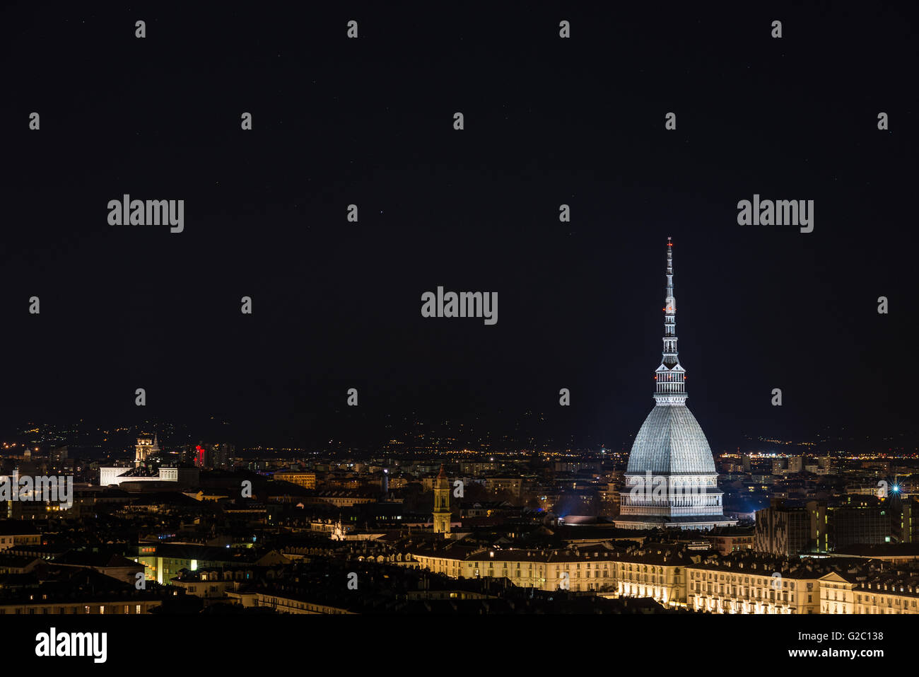Panorama of Torino (Turin), Piedmont, Italy, with wonderful starry sky. Cityscape from above with the Mole Antonelliana towering Stock Photo