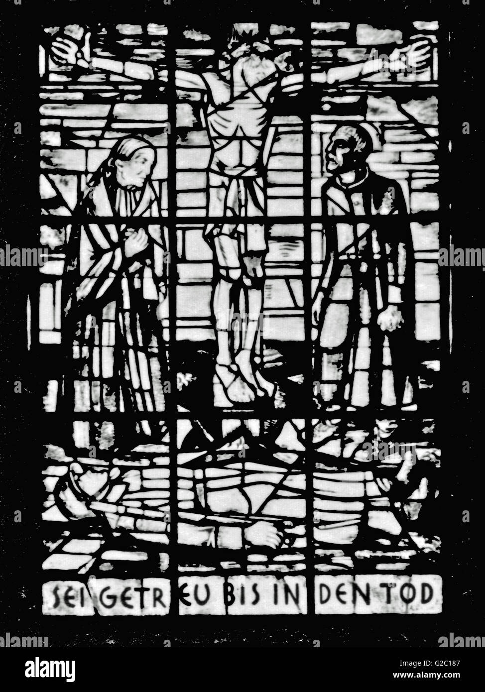 Glass Window at Tannenberg Memorial East Prussia. A mother, Jesus and a Soldier, Writing:  'Be Faithful until death', was to find at the Soldier Tower. (No 6)  Tower) Stock Photo