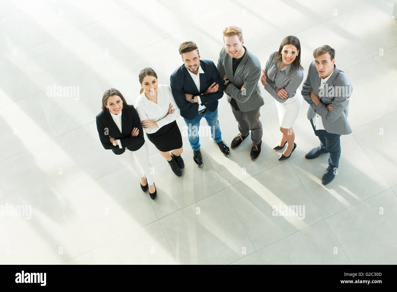Top view of satisfied young business pepole in the office Stock Photo