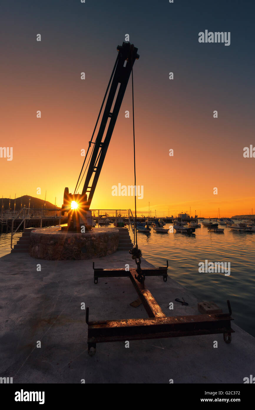 Crane lifting small boat hi-res stock photography and images - Alamy