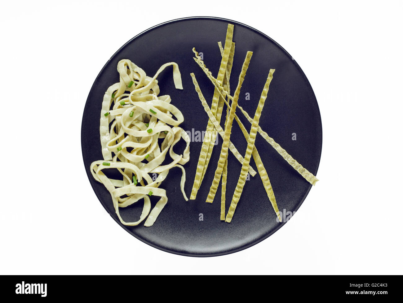 raw and cooked organic Edamame and Mung Bean Fettuccine Stock Photo