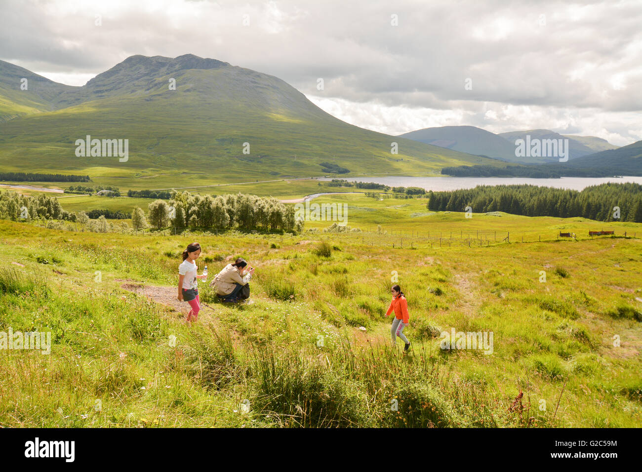 Glencoe tourists, Scottish Highlands, Scotland, UK Stock Photo