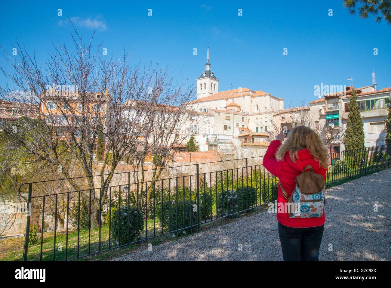 Woman taking photos with her mobile phone. Colmenar de Oreja, Madrid province, Spain. Stock Photo