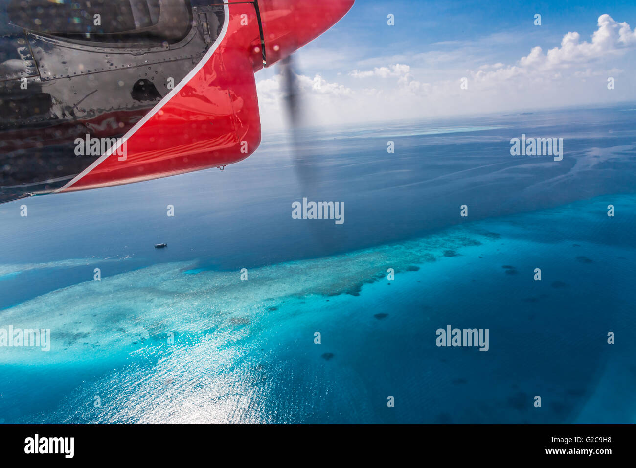 Aerial view from a seaplane on Maldives island Stock Photo