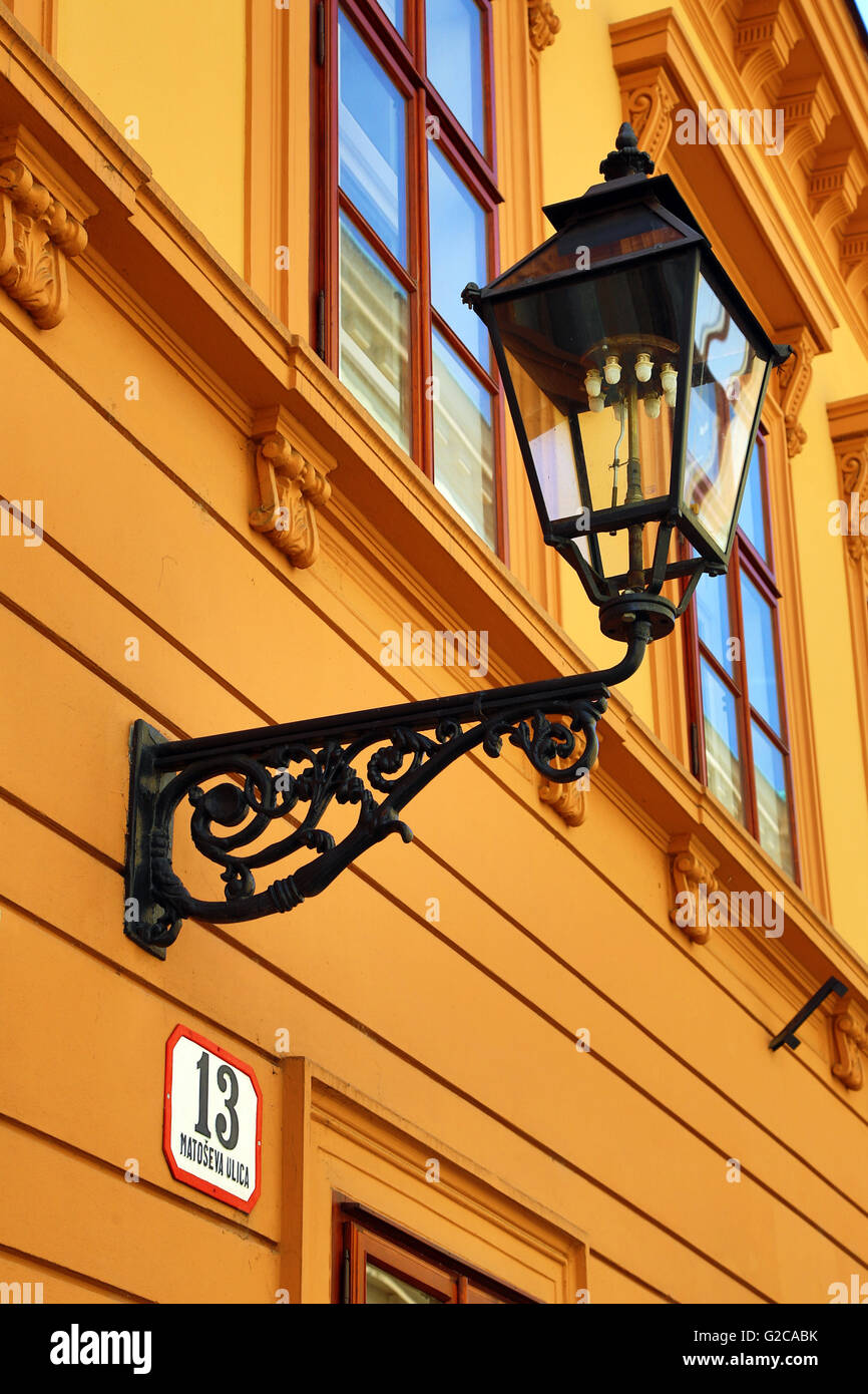Metal street lamp on a building in Matoseva Ulica in Zagreb, Croatia Stock Photo