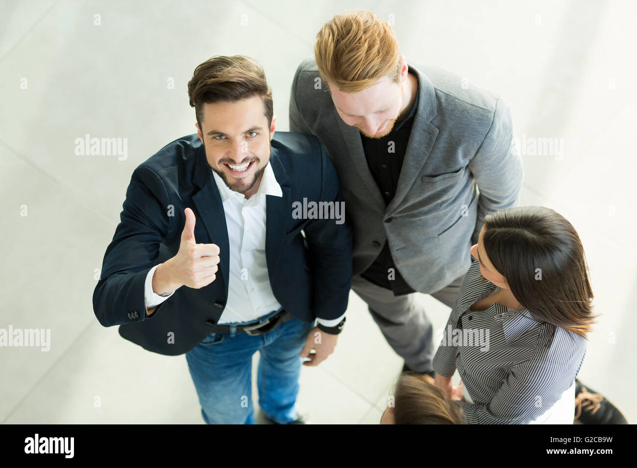 Top view of satisfied young business pepole in the office Stock Photo