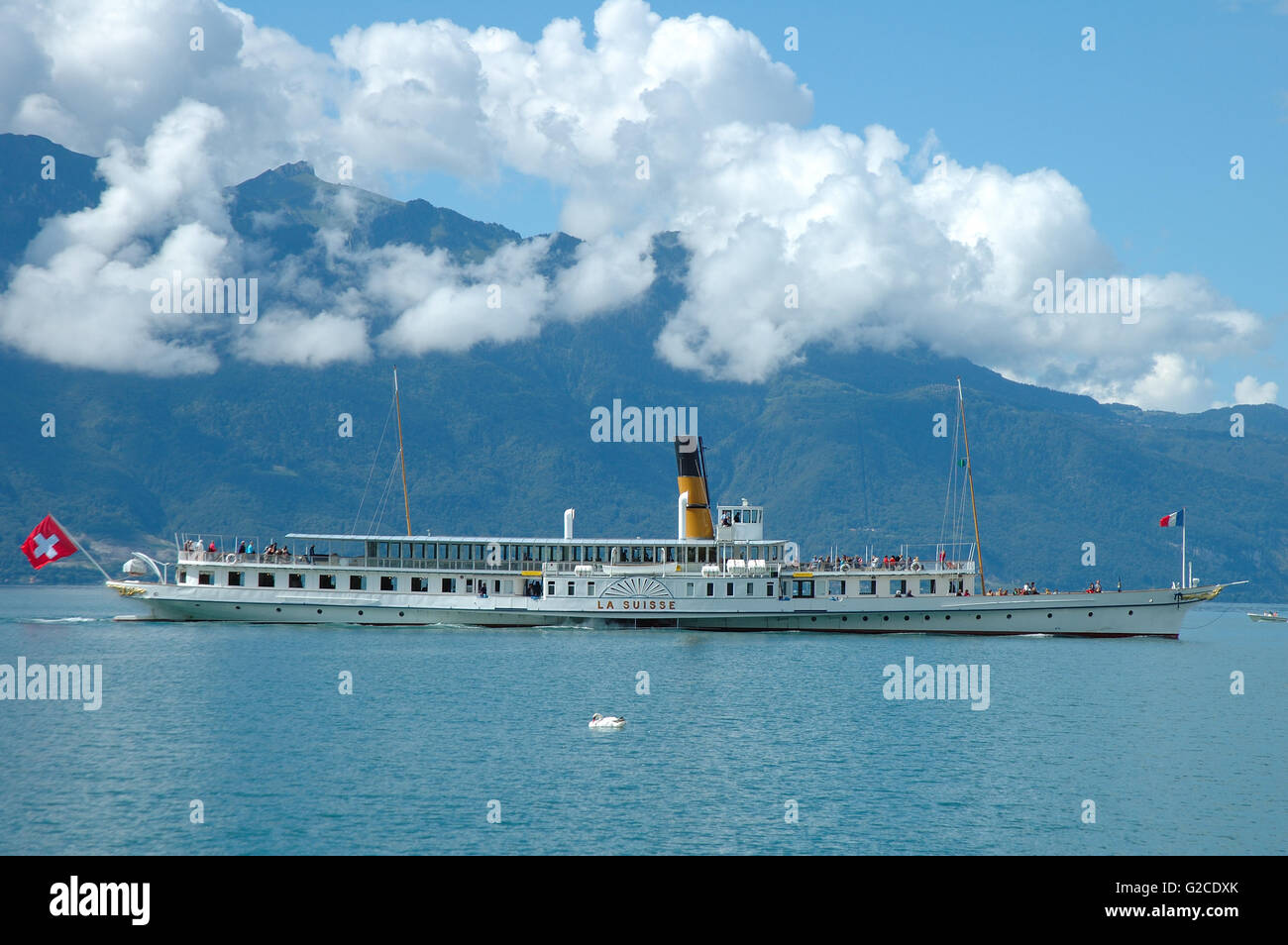 Vevey, Switzerland - August 16, 2014: Old Passenger ferry on Geneve lake in Switzerland. Unidentified people visible. Stock Photo