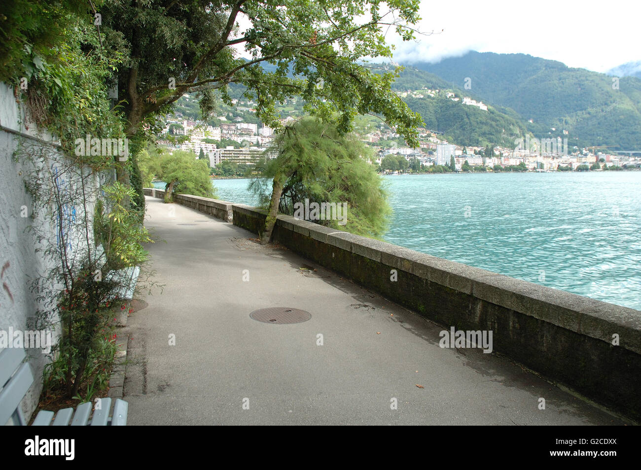 Walk, mountains and buildings in Montreux at Geneve lake in Switzerland Stock Photo