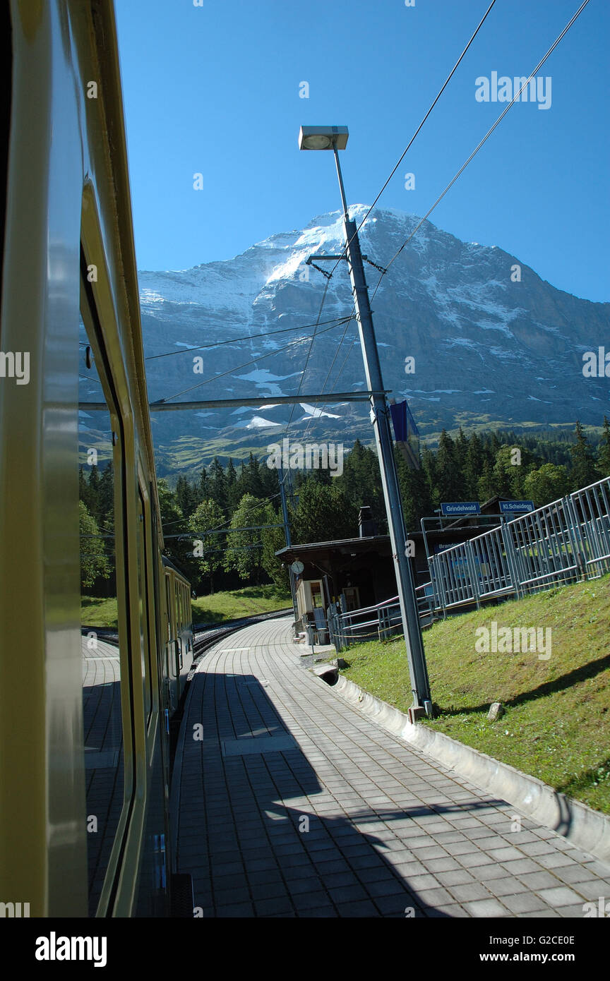 Small train station nearby Eiger mountain and Grindelwald in Switzerland. Stock Photo