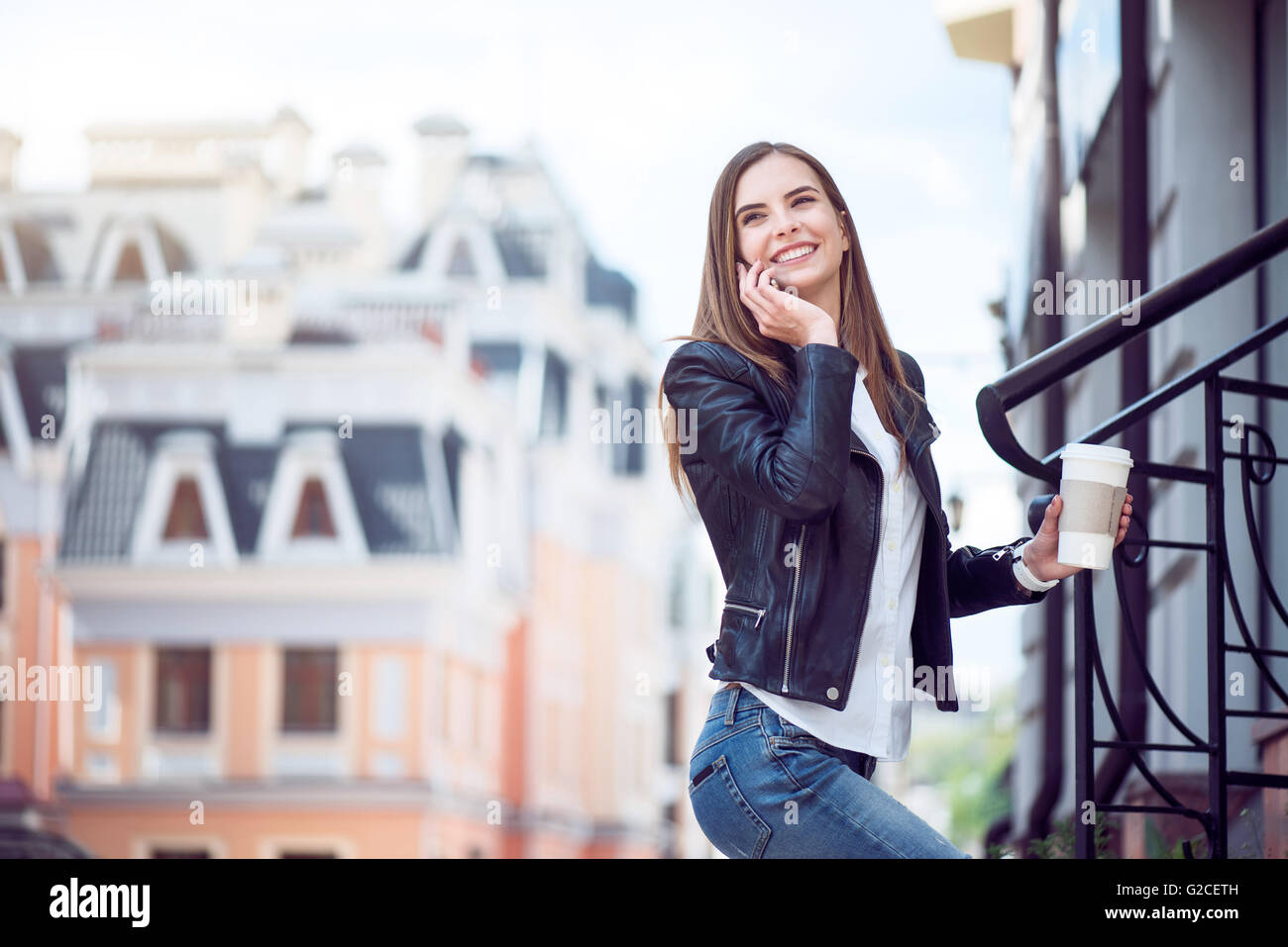 Modern young woman in a big city Stock Photo