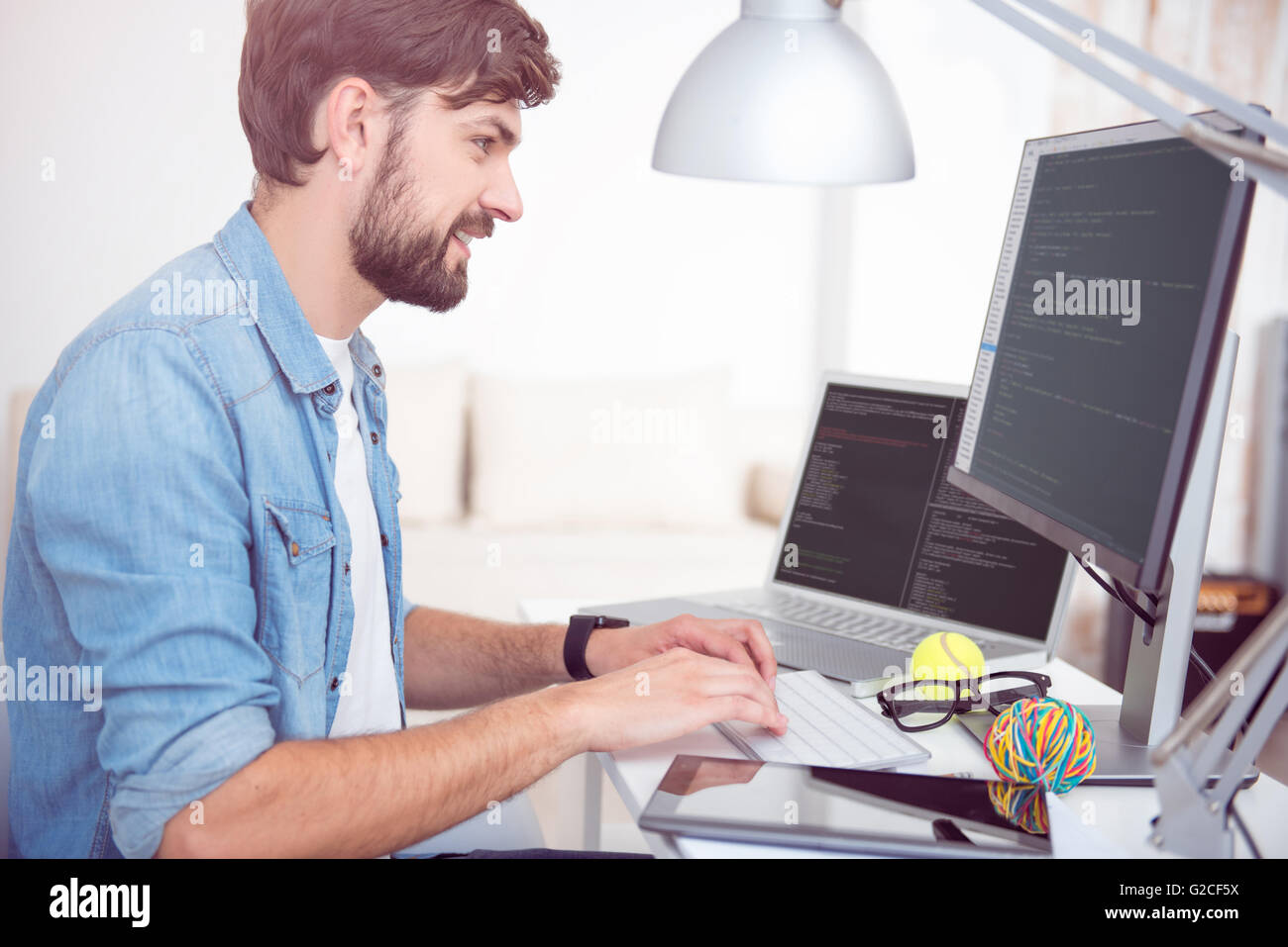 Man programming hi-res stock photography and images - Alamy