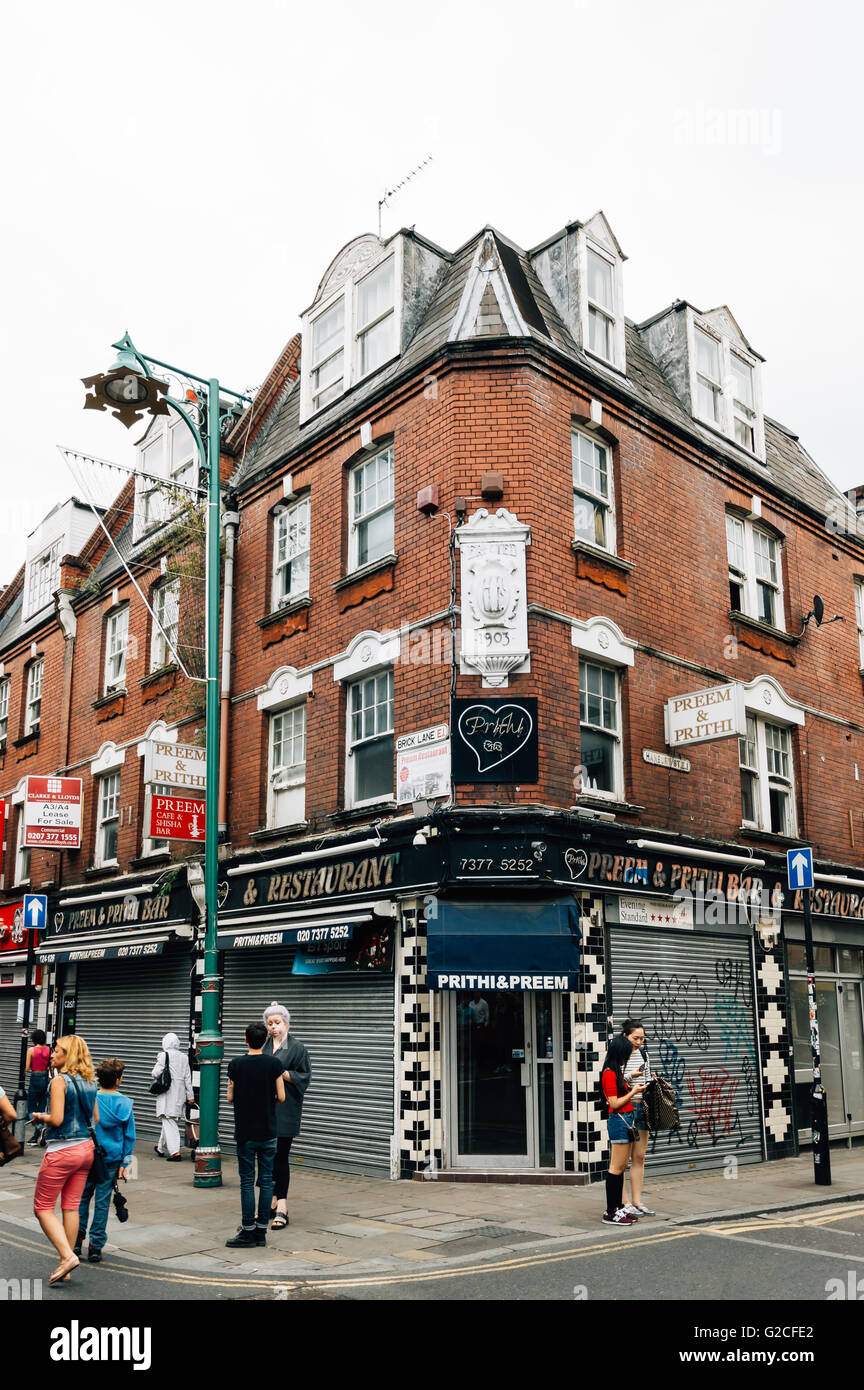 LONDON, UK - AUGUST 23, 2015: Brick Lane is a street in east London, It is famous for its many curry houses Stock Photo