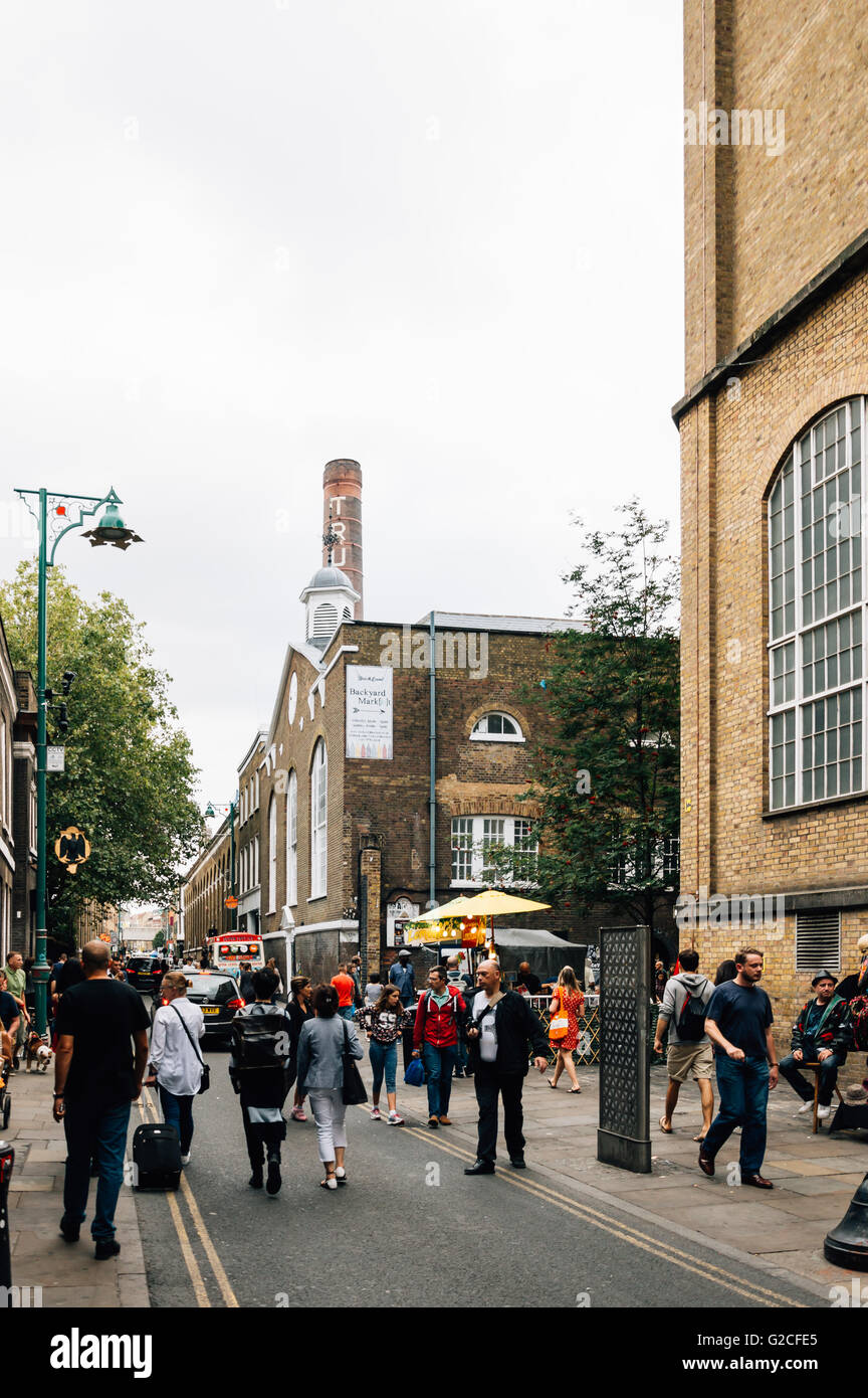 LONDON, UK - AUGUST 23, 2015: Brick Lane is a street in east London, It is famous for its many curry houses Stock Photo