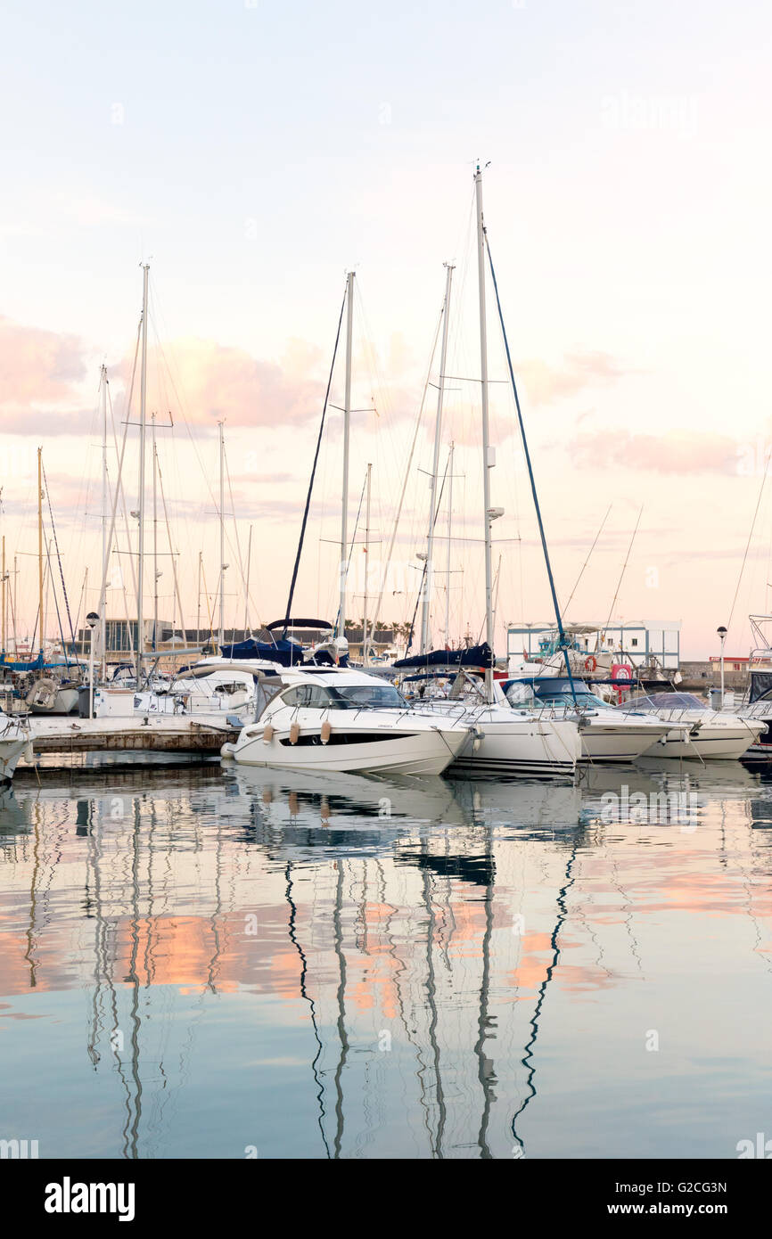 Yachts moored in the marina at sunset, Estepona, Andalusia Spain Stock Photo