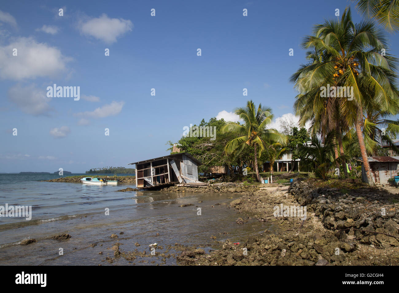 Chea Village, Solomon Islands - May 31, 2015: Destroyed house along the coastline in a village on the Solomon Islands Stock Photo