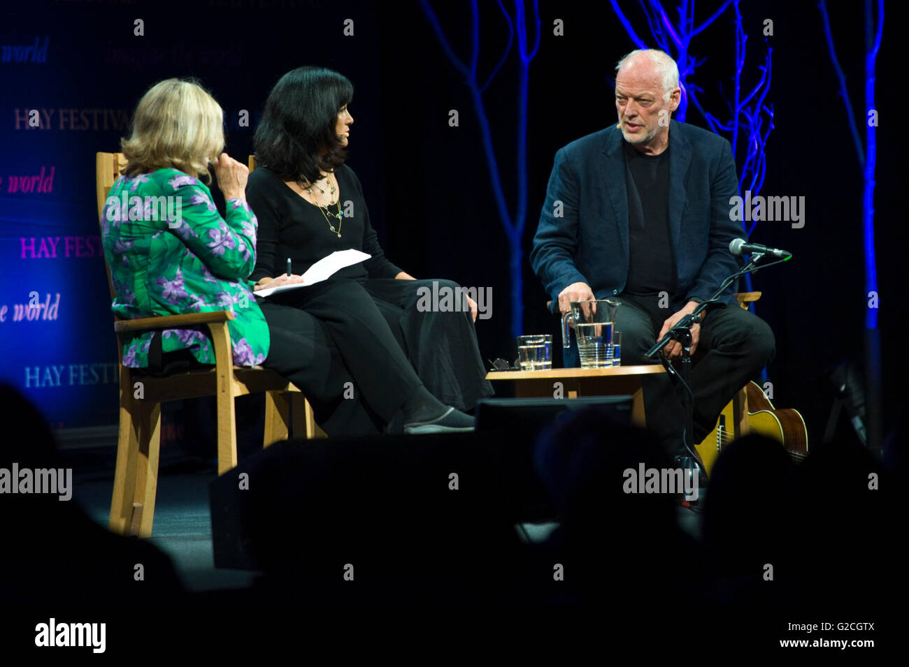David Gilmour Pink Floyd guitarist talking about his life & work with his wife Polly Samson on stage at Hay Festival 2016 Stock Photo