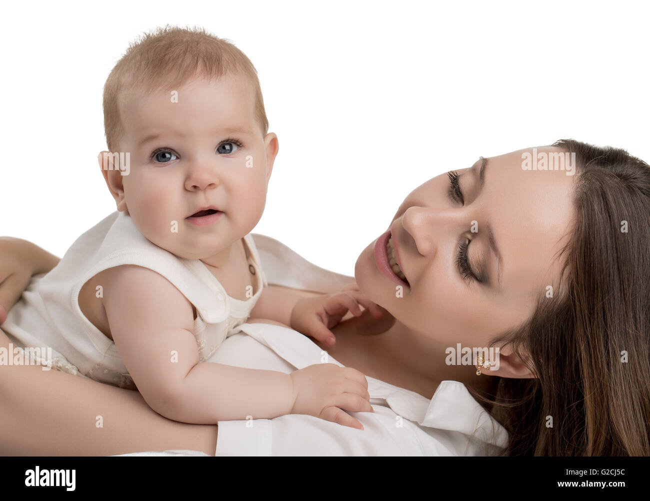 Happy young mother tenderly holding her daughter Stock Photo - Alamy