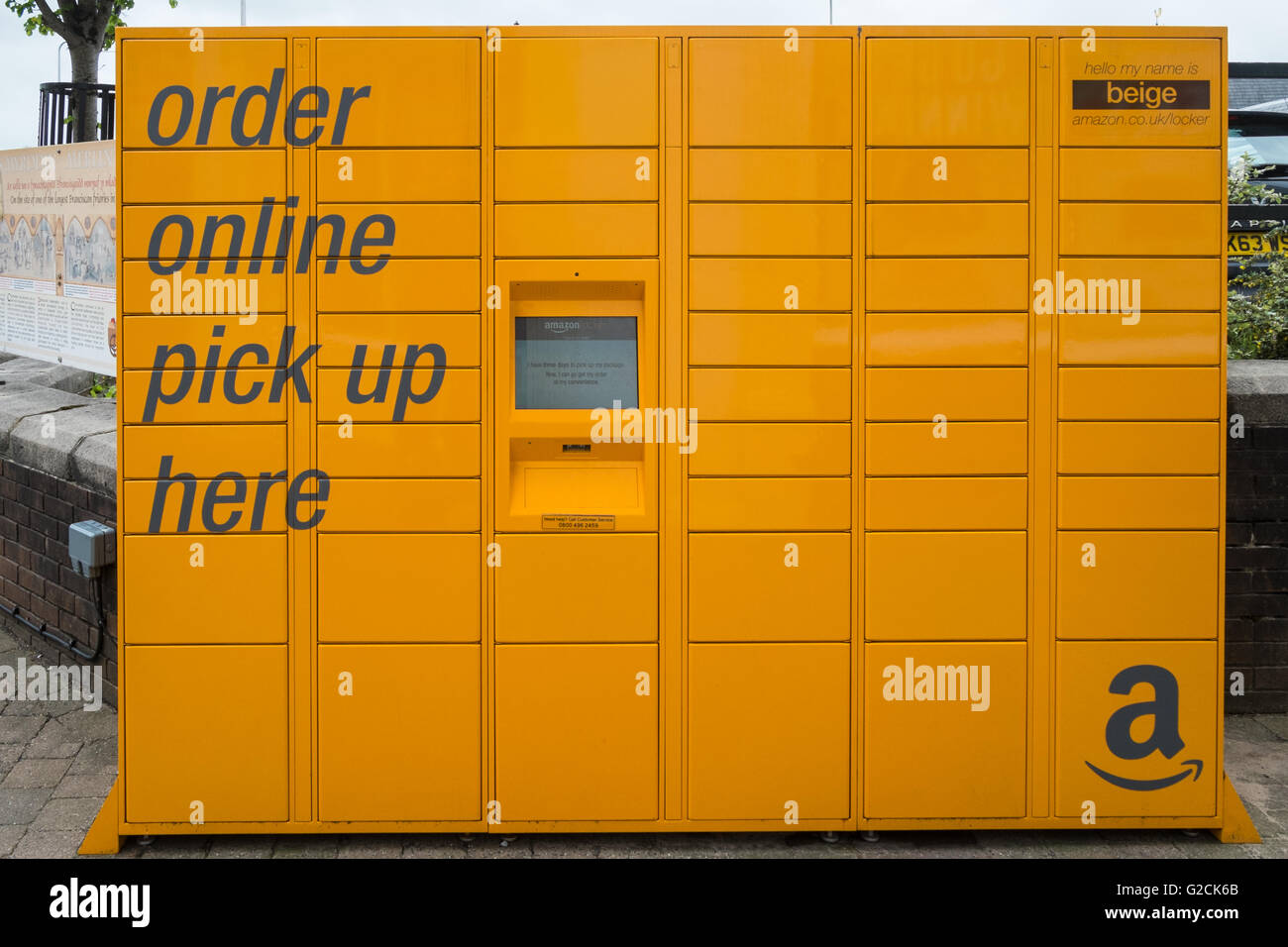 Amazon locker pick up boxes for ordering online in Carmarthen Town centre,Carmarthenshire,Wales,U.K. Stock Photo