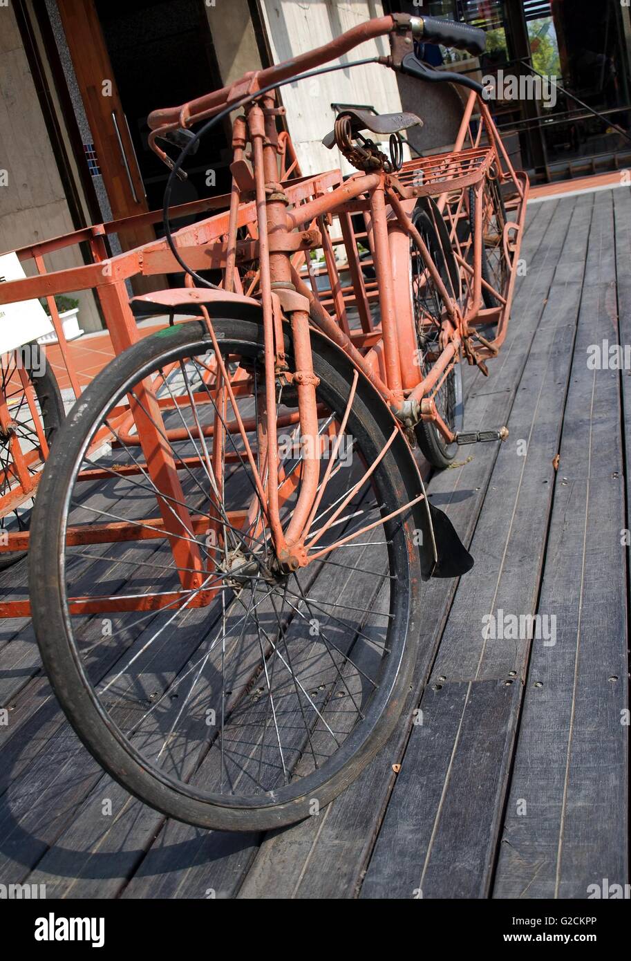 An old peasants bike with sidecar and trailer Stock Photo