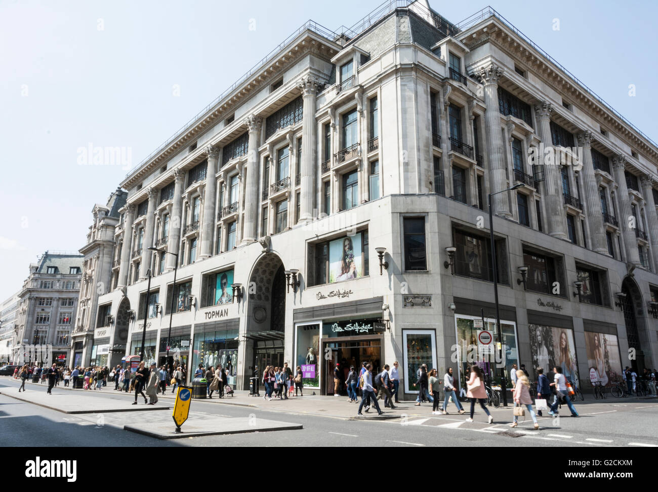 Crowds of shoppers outside Topshop in Oxford Street, London, England, UK Stock Photo