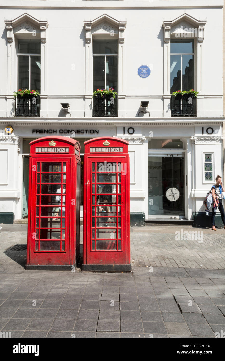 K6 Red phone boxes on Argyll Street in central London Stock Photo