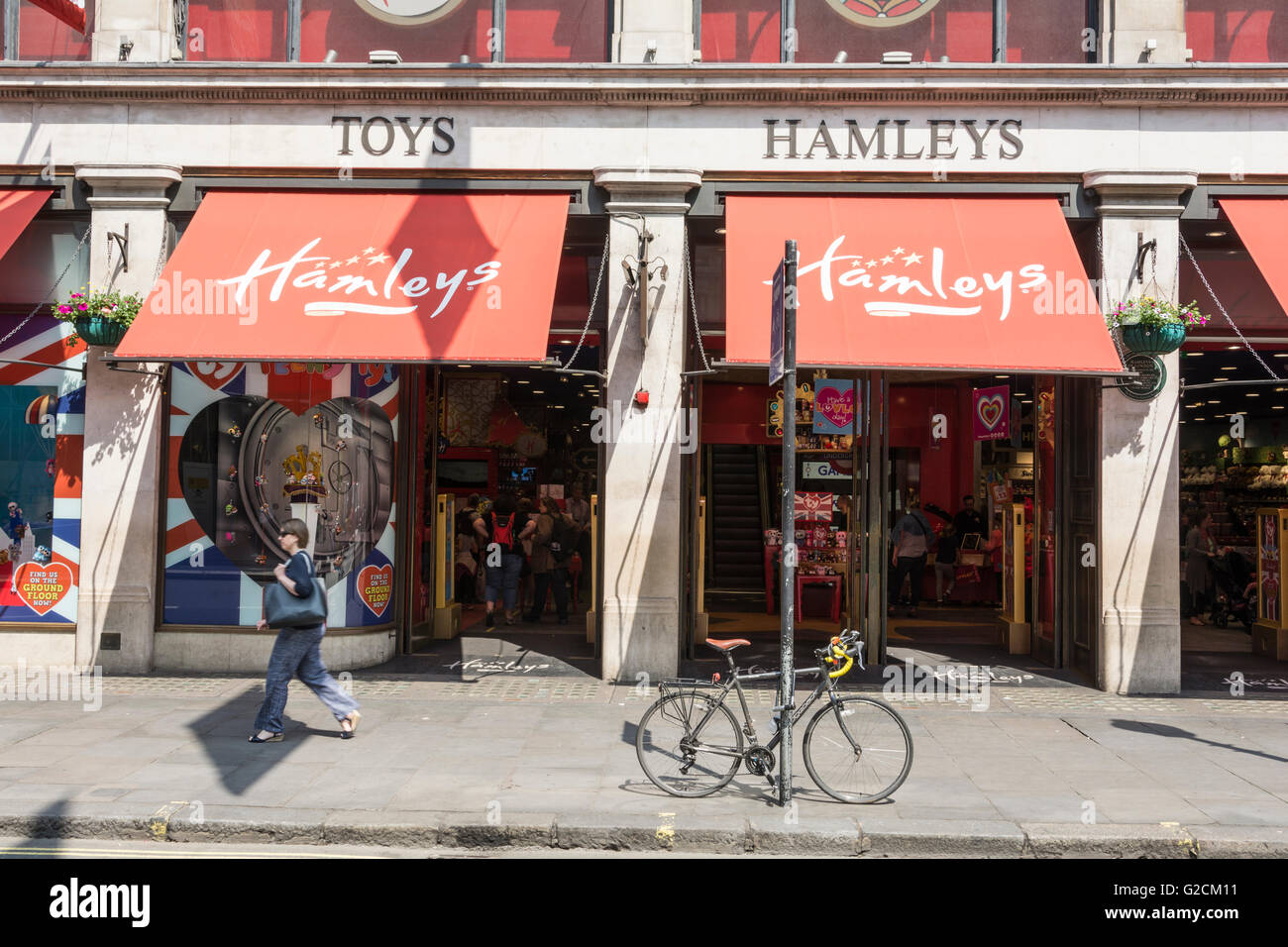 People walking in Front of the famous Hamleys toy store in central London, UK Stock Photo