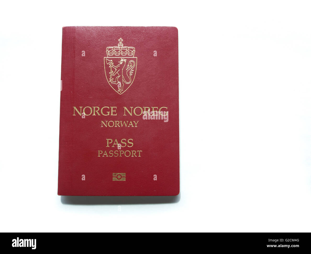 Norwegian passport , front cover red and gold on white background Stock Photo