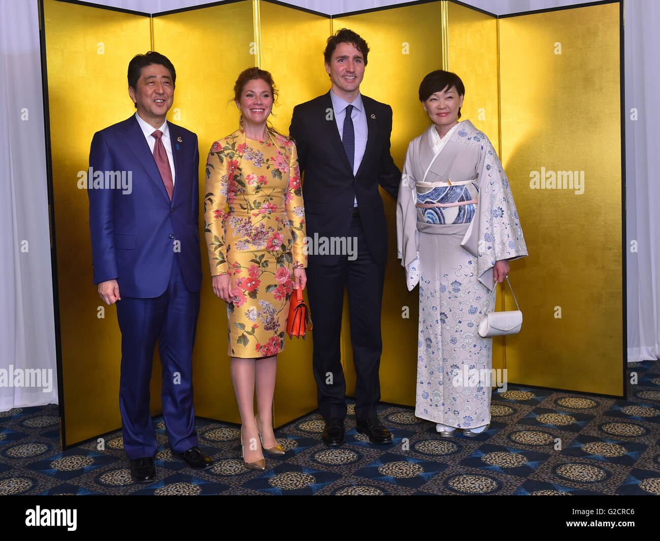 Japanese Prime Minister Shinzo Abe and his wife Akie Abe, stand with ...