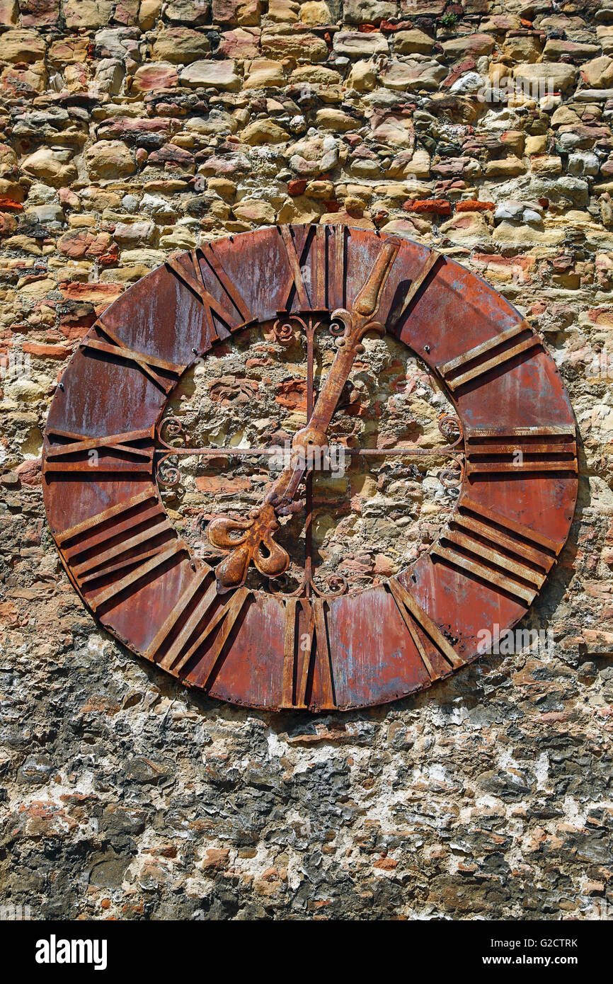 Old rusty clock on the wall beside Zagreb Cathedral in Zagreb, Croatia Stock Photo