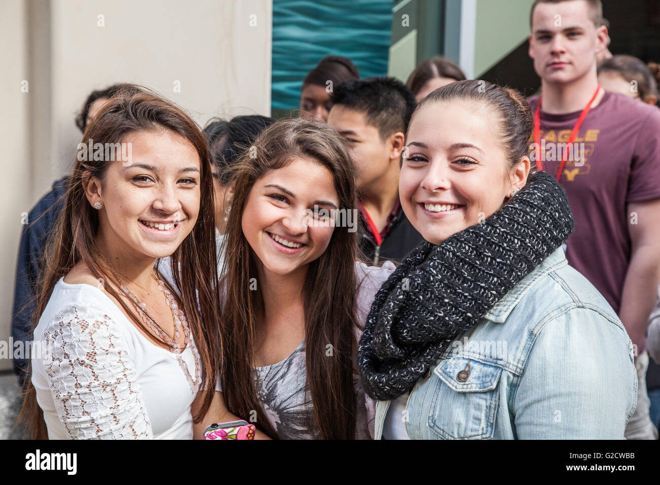 Three smiling high school girls Stock Photo