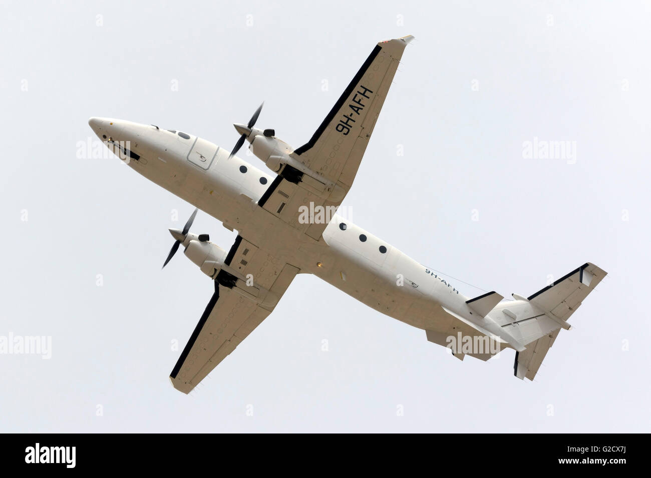 Medavia Raytheon 1900D [9H-AFH] climbing out of runway 13. Stock Photo