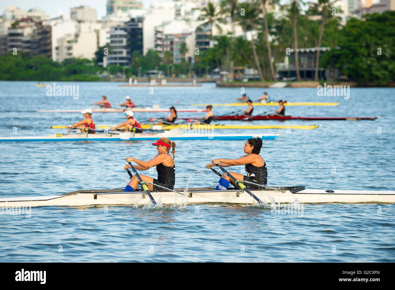 RIO DE JANEIRO - APRIL 2, 2016: Teams of rowers compete in a race on ...