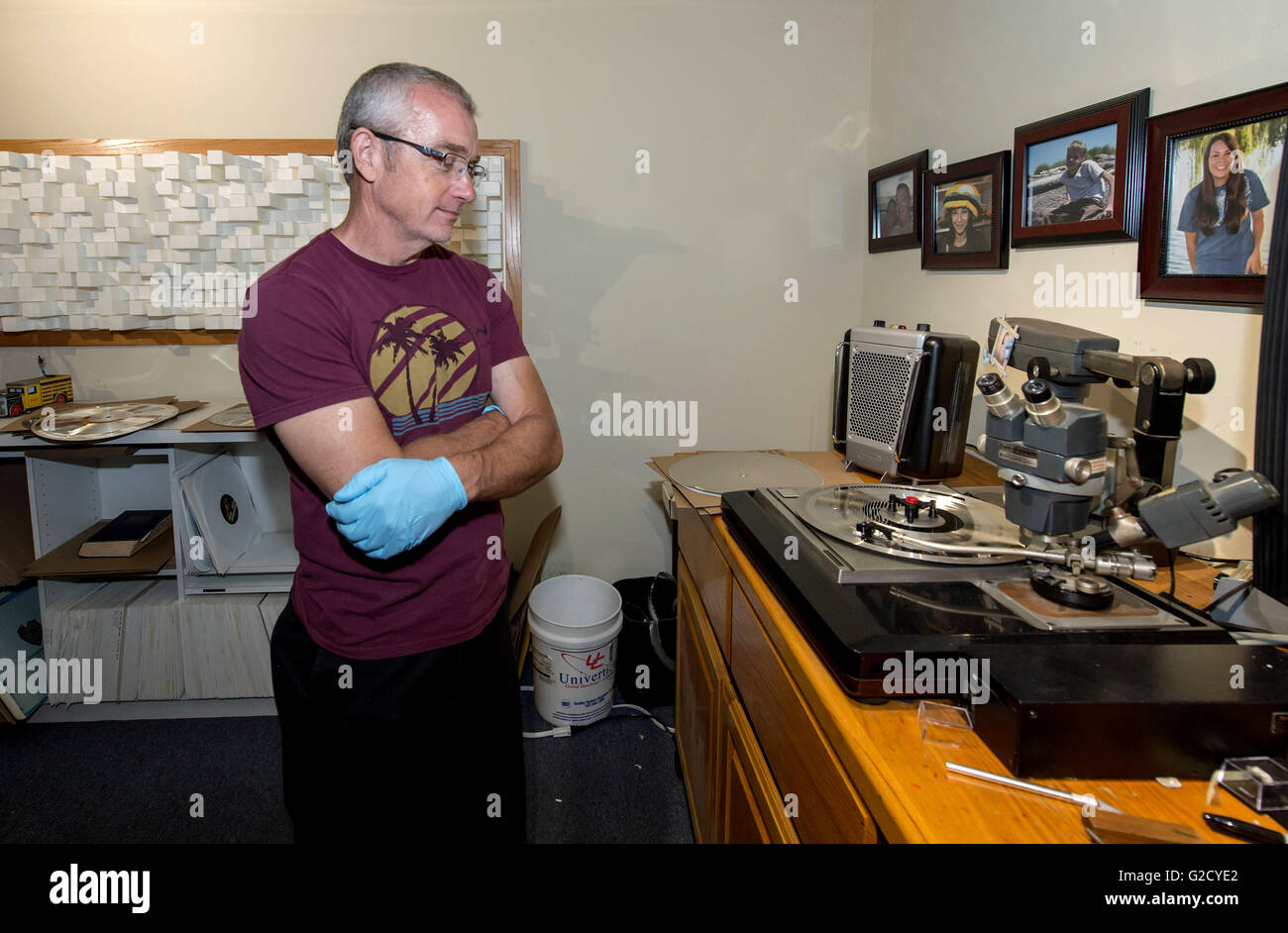 Camarillo, California, USA. 25th May, 2016. Plating supervisor DORIN SAUERBIER listens to the newly created stamper of a James Taylor album at record pressing plant, Record Technology, Inc. Founded in 1978, Music Matters Jazz is dedicated to re-releasing new pressings of historic Blue Note Records jazz titles on 45 and 33 RPM, 180g virgin vinyl. Each of the re-issued jazz albums is restored and remastered from the original master analog tapes and features the iconic Blue Note cover art with gatefold jackets and additional photos from the original sessions.(Credit Image: © Brian Cahn via ZU Stock Photo