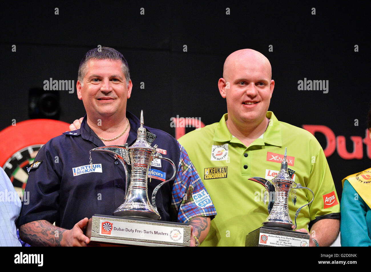 DUBAI, UAE, 27th March 2016. Scotland's Gary Anderson and Netherlands'  Michael van Gerwen pose for the press after the 2016 Dubai Duty Free Darts  Masters Tournament. Anderson beat defending three time DDF