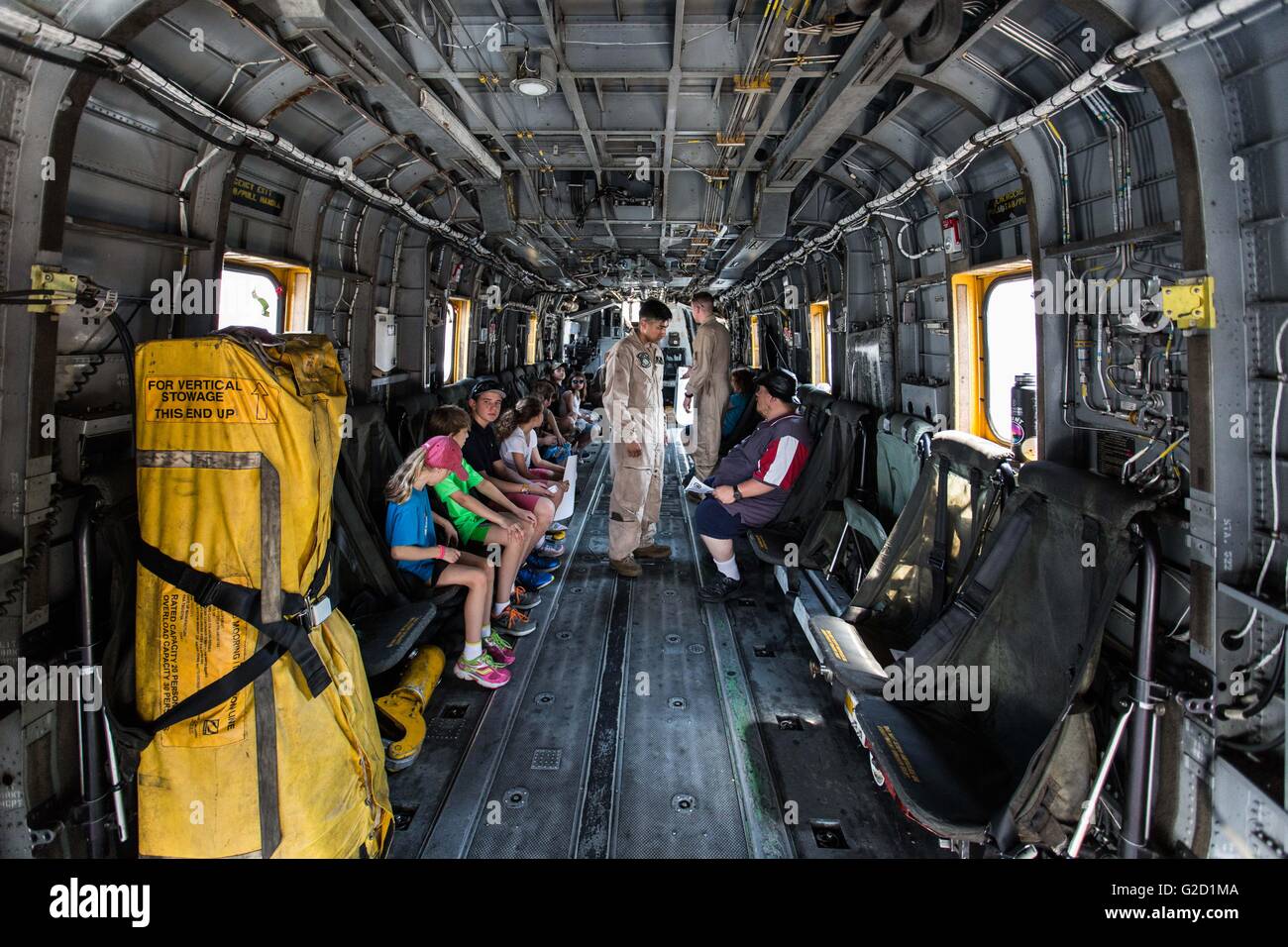 New York, USA. 27th May, 2016. New York, Annual New York Fleet Week in New York. 27th May, 2016. People sits inside a Sikorsky CH-53E Super Stallion helicopter on board the USS Bataan (LHD-5), Wasp-class amphibious assault ship, during the 28th Annual New York Fleet Week in New York, the United States on May 27, 2016. New York Fleet Week takes place from May 25 to May 30, where hundred of service men and women in the Armed Forces visit New York City as part of Memorial Day commemorations. Credit:  Li Muzi/Xinhua/Alamy Live News Stock Photo