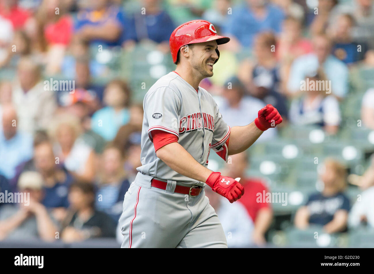 Milwaukee, WI, USA. 27th May, 2016. Cincinnati Reds left fielder Adam Duvall #23 crosses home plate after hitting a three run homer to left field in the first inning of the Major League Baseball game between the Milwaukee Brewers and the Cincinnati Reds at Miller Park in Milwaukee, WI. Reds lead the Brewers 3-0. John Fisher/CSM/Alamy Live News Stock Photo