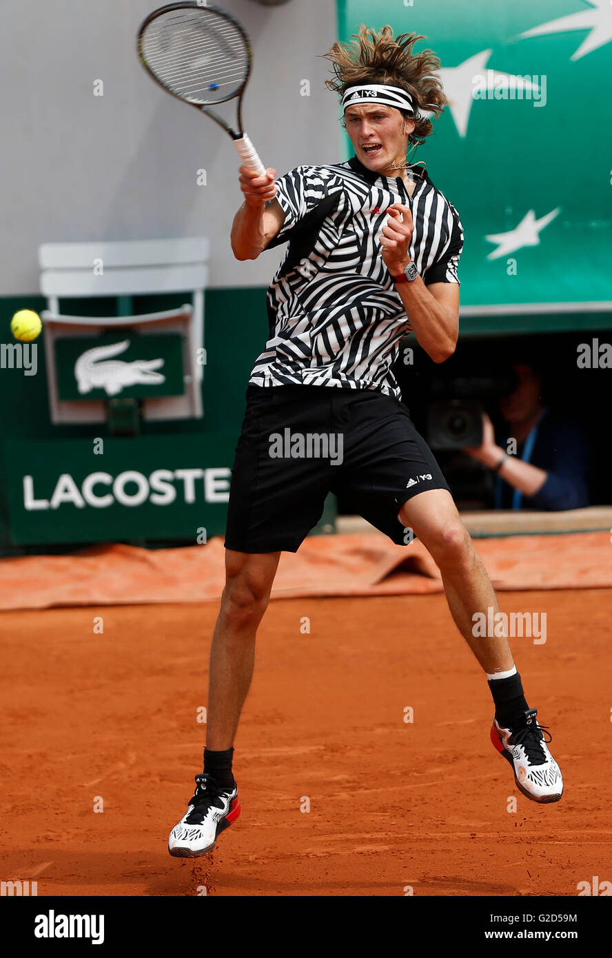 Paris, France. 28th May, 2016. Alexander Zverev of Germany competes during  the men's singles third round match against Dominic Thiem of Austria at the French  Open tennis tournament at Roland Garros in