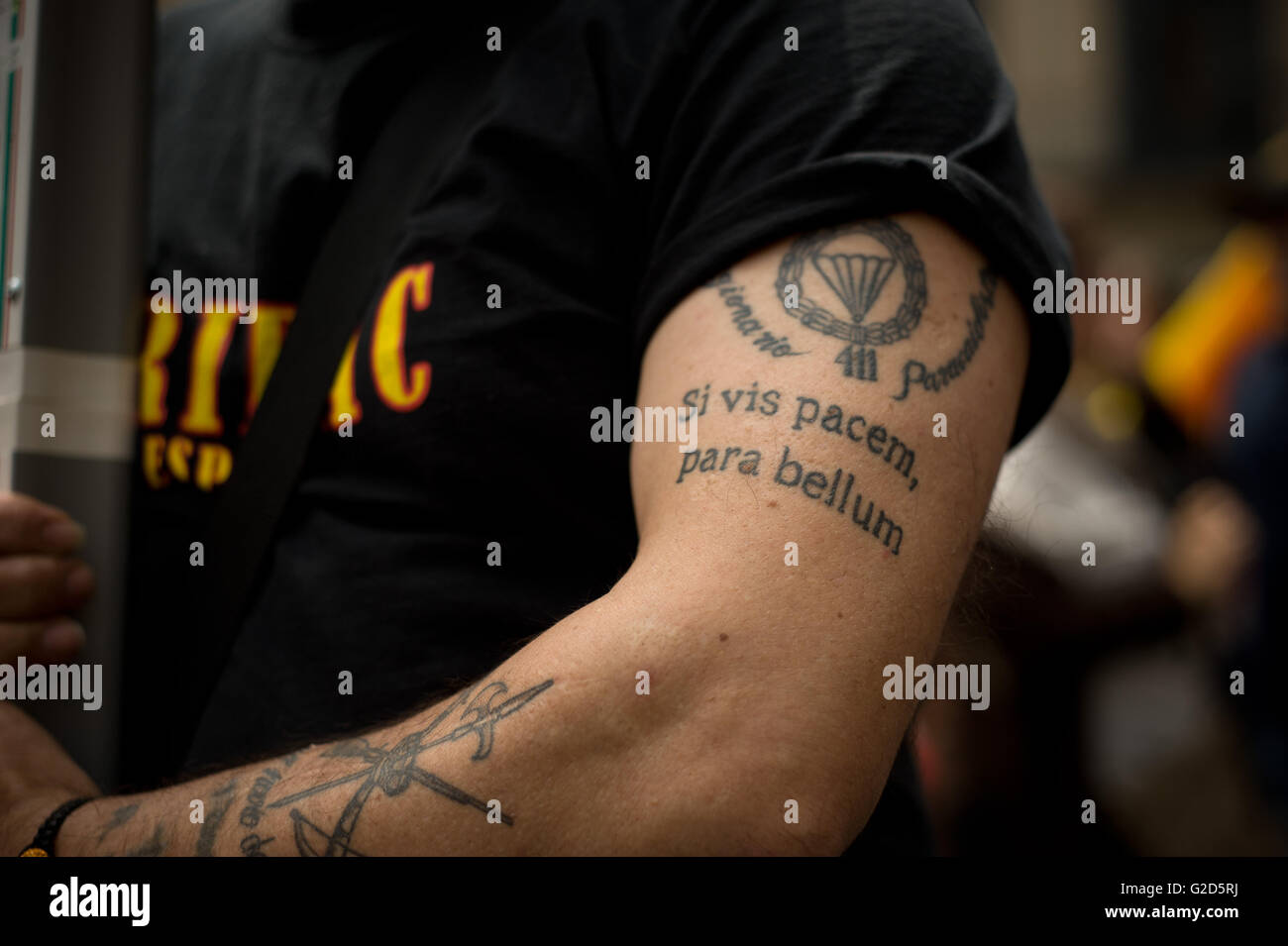 May 28, 2016 Barcelona, Catalonia, Spain - veteran army member of La Legion with a tattooed arm ( in latin language 'Si vis pacem, para bellum' meaning 'if you