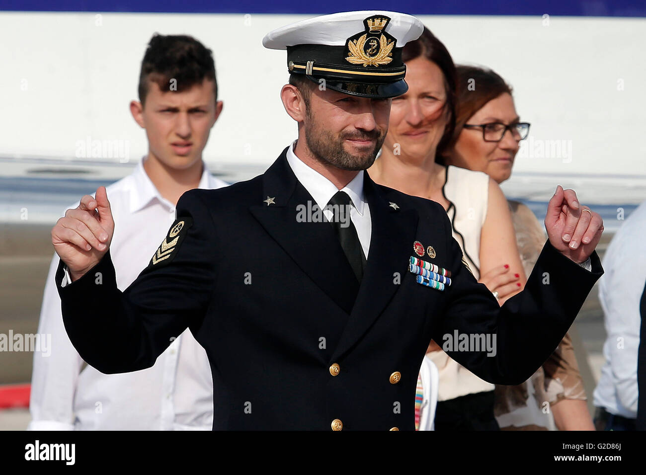 Salvatore Girone smiles at journalists with his family, his wife Vania, and their children, Michele and Martina Rome 28th May 2016. Return of Salvatore Girone, the non-comissioned officer of the Italian Navy, arrested in India under the accusation of murder. Photo Samantha Zucchi Insidefoto Stock Photo