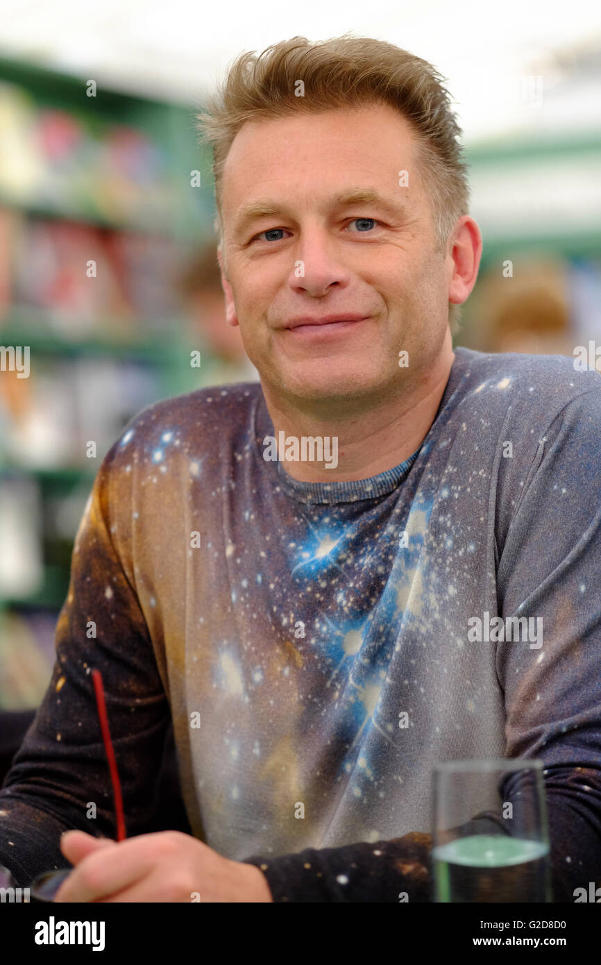Hay Festival - May 2016 - Author, broadcaster and wildlife champion Chris Packham in the Festival bookshop to sign copies of his latest book for children titled Amazing Animal Journeys. Stock Photo