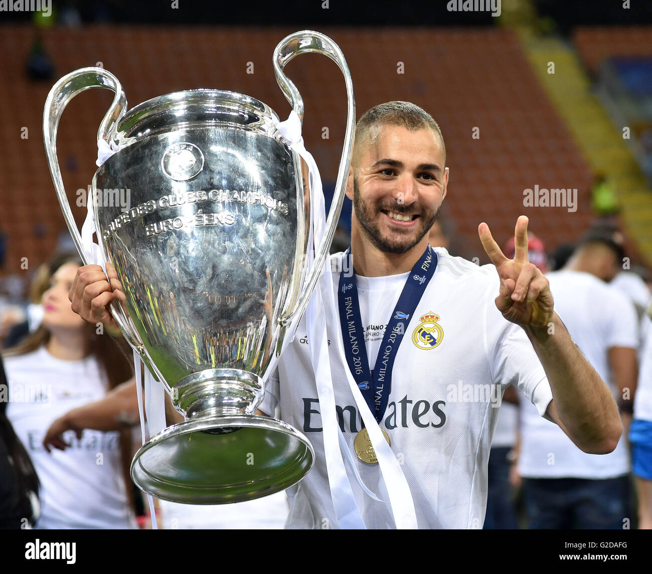 Milan, Italy. 28th May, 2016. Karim Benzema of Real Madrid poses with the  trophy after winning the UEFA Champions League Final match against Atletico  Madrid in Milan, Italy, May 28, 2016. Real