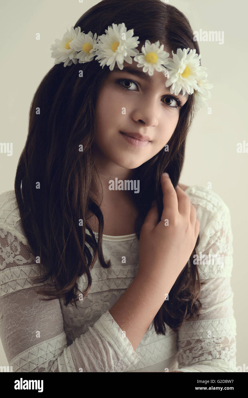 portrait young girl with flowers in hair Stock Photo - Alamy