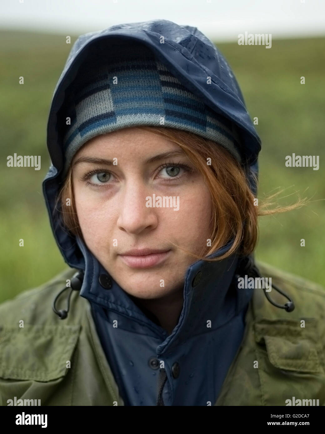 Portrait of Young Woman in Rain Gear Stock Photo Alamy