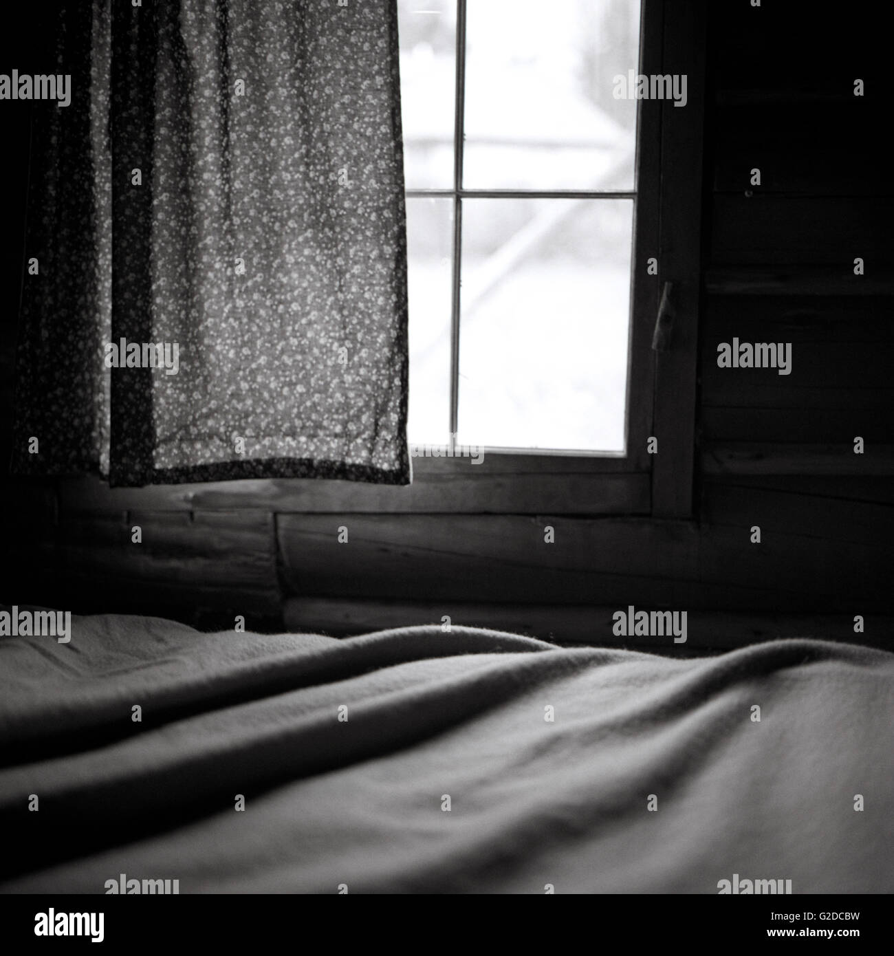 Window and Curtain by Bed Stock Photo
