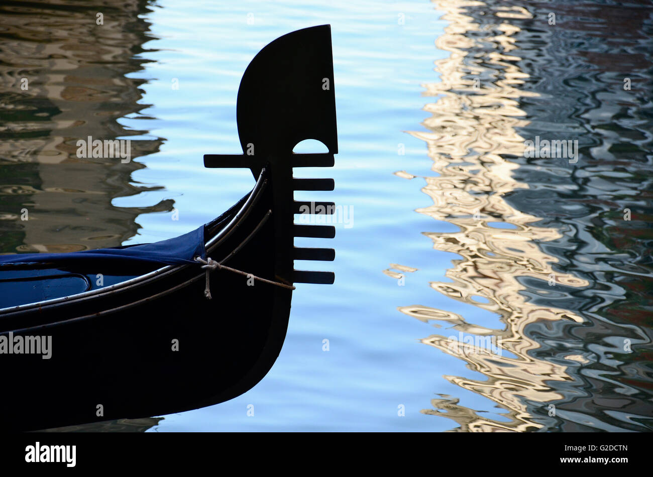 Gondola Detail Reflected Against Water, Venice, Italy Stock Photo