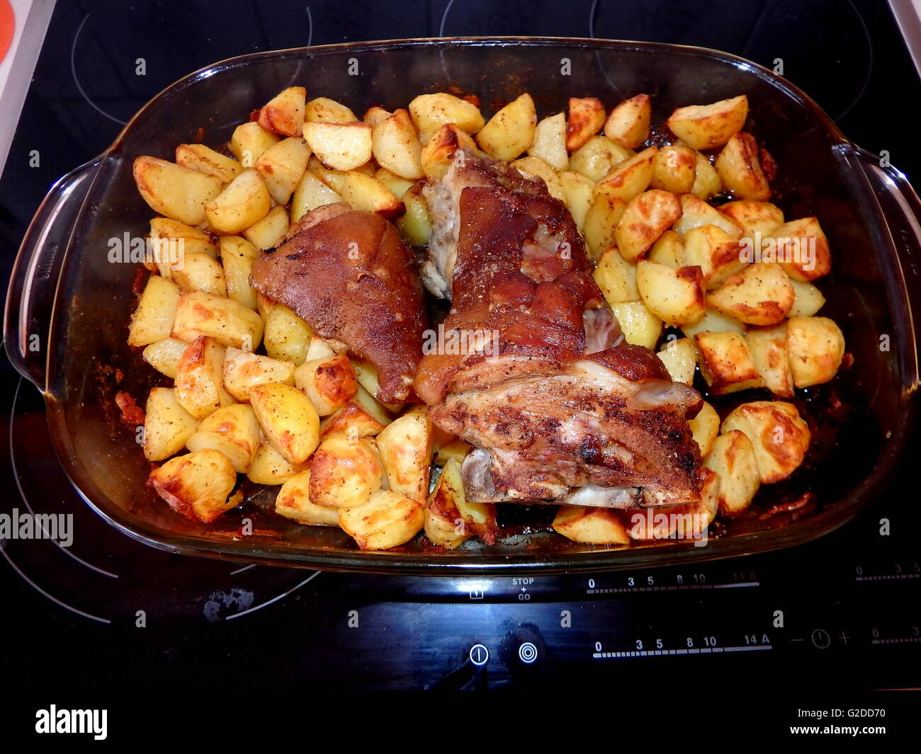 roasted pork knuckle with potatoes,roast pork Stock Photo Alamy