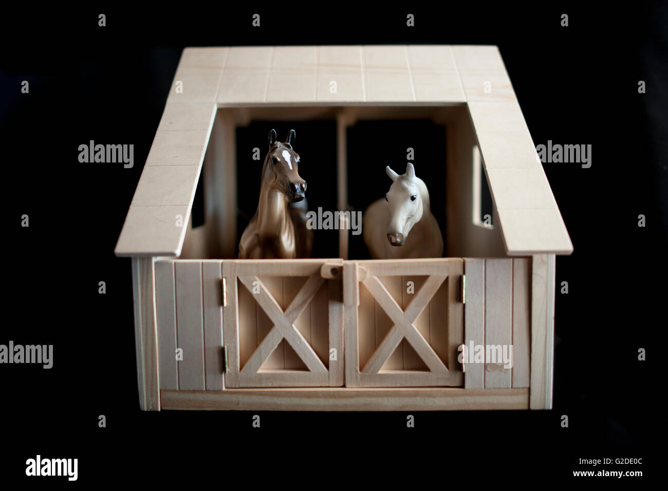 Two Miniature Toy Horses in Stable Stock Photo Alamy