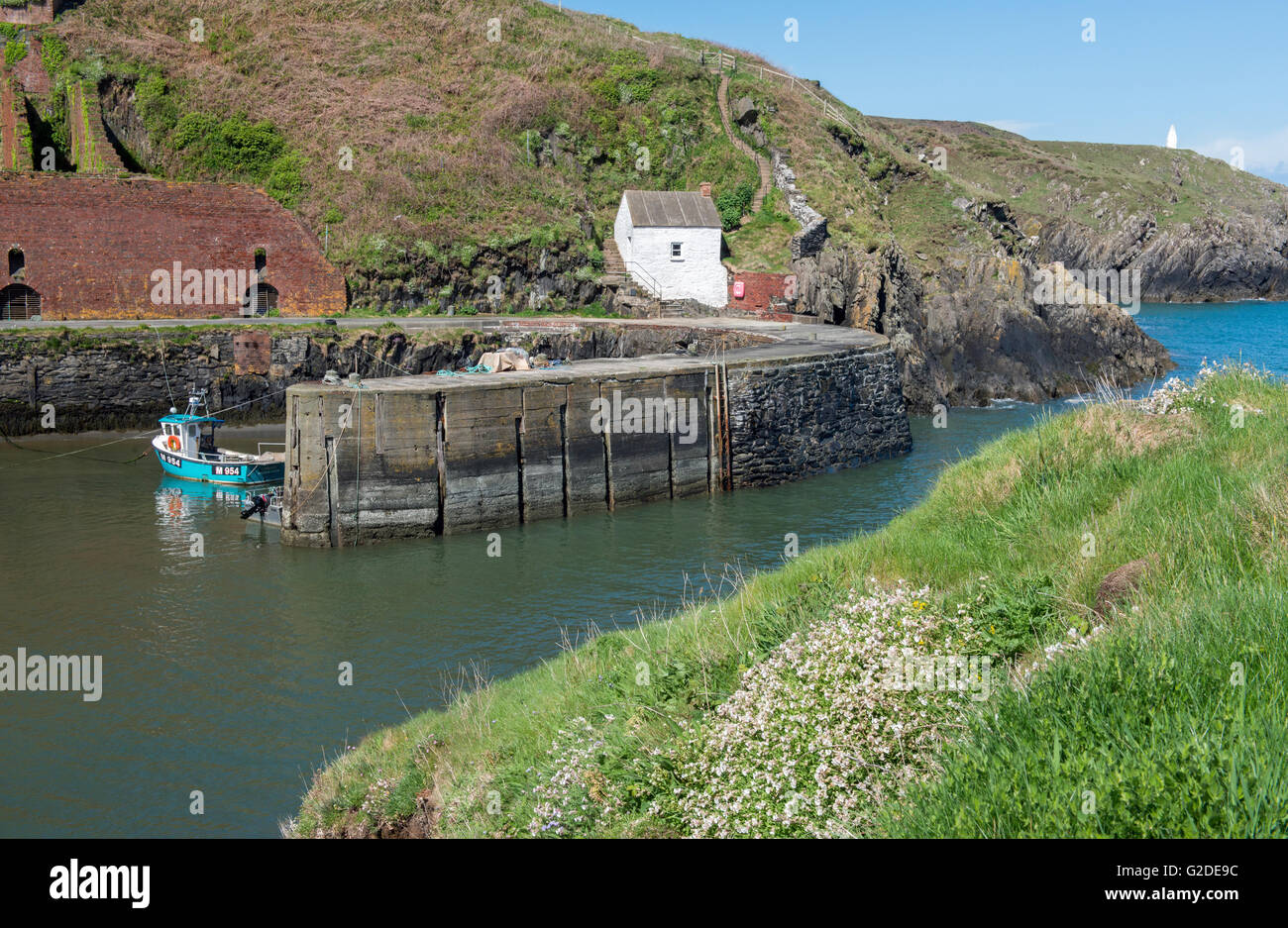 Entrance to Porthgain Harbour on the Pembrokeshire Coast National Park Coastline, west Wales, on a sunny Spring day Stock Photo
